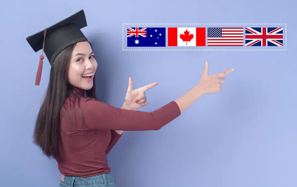 Student in a graduation cap pointing to flags of study destinations