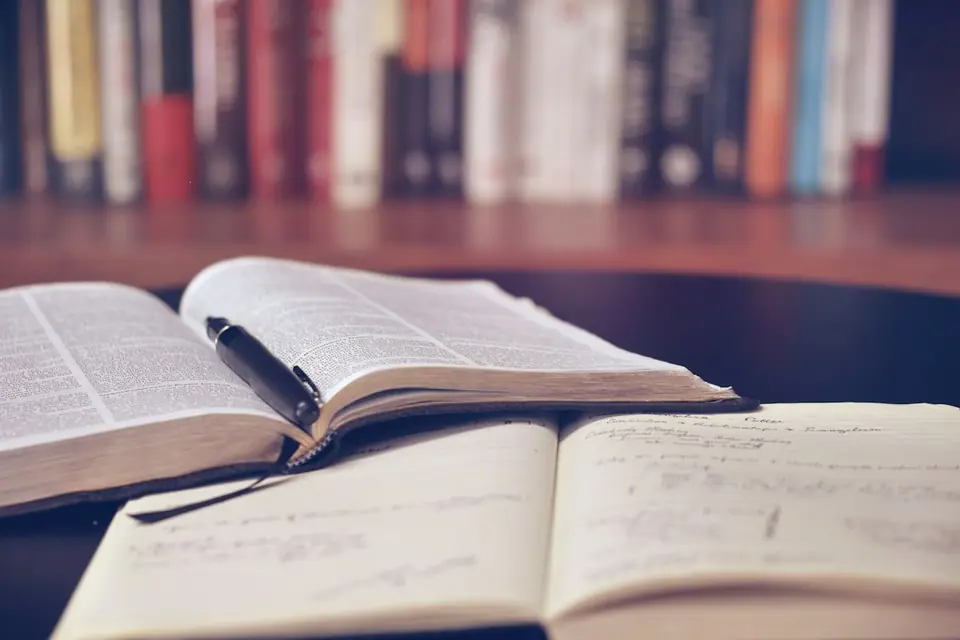 Open books on a library desk