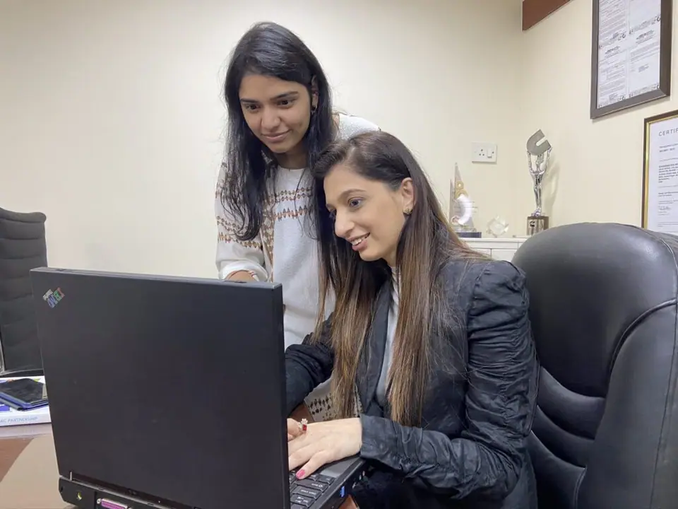 UEMS counsellors reviewing an application together